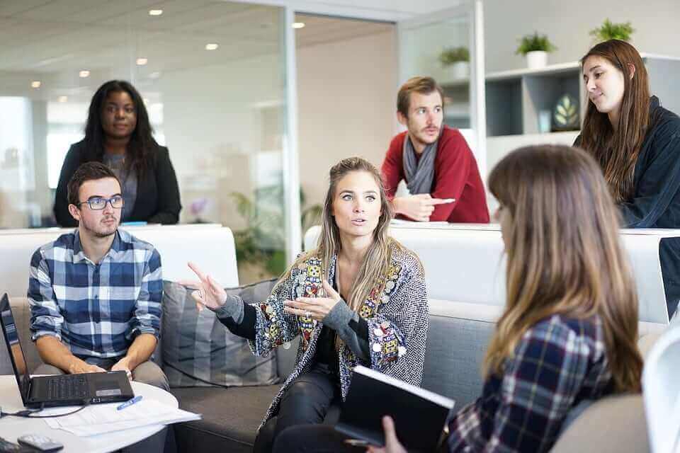 A group of people conducting a business meeting